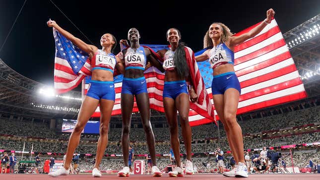The United States team of Allyson Felix, Athing Mu, Dalilah Muhammad and Sydney Mclaughlin, from left, celebrate winning the gold medal in the final of the women’s 4 x 400-meter relay at the 2020 Summer Olympics, Saturday, Aug. 7, 2021, in Tokyo, Japan.