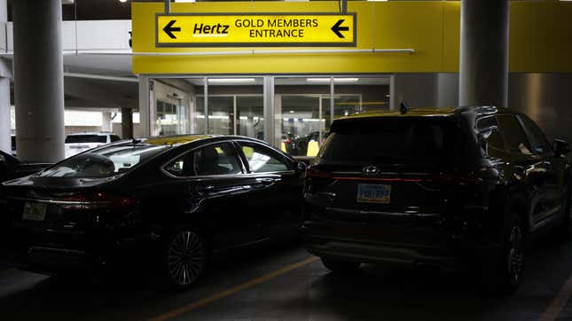 Rental vehicles parked at a Hertz location at the Louisville International Airport in Louisville, Kentucky, U.S.