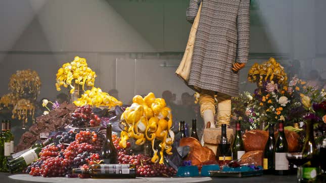 Literally piles of food on the runway for Raf Simons’ menswear fashion show.