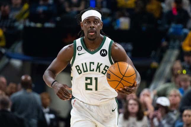 Mar 29, 2023; Indianapolis, Indiana, USA; Milwaukee Bucks guard Jrue Holiday (21) dribbles the ball in the first quarter against the Indiana Pacers at Gainbridge Fieldhouse.
