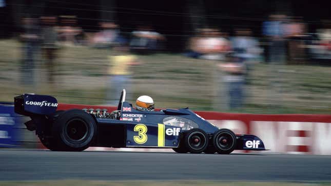 A photo of the six-wheeled Tyrrell Formula 1 car from the 1970s. 