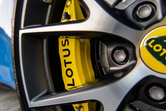 The yellow Lotus-branded brake caliper of the 2023 Lotus Emira