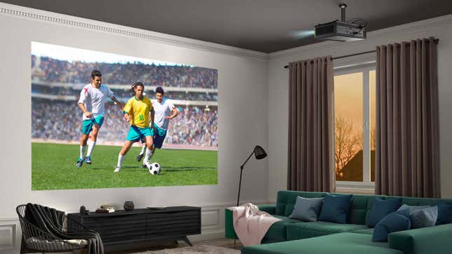 The Viewsonic X1-4K projector mounted to the ceiling of a living room with a soccer game being projected on a blank wall.
