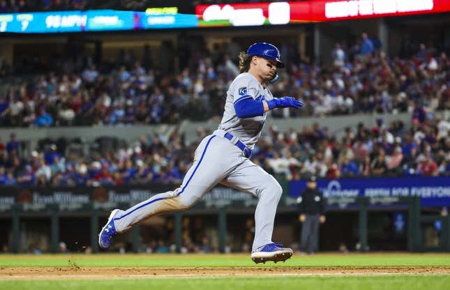 Apr 11, 2023; Arlington, Texas, USA;  Kansas City Royals shortstop Bobby Witt Jr. (7) rounds third base and scores during the eighth inning against the Texas Rangers at Globe Life Field.