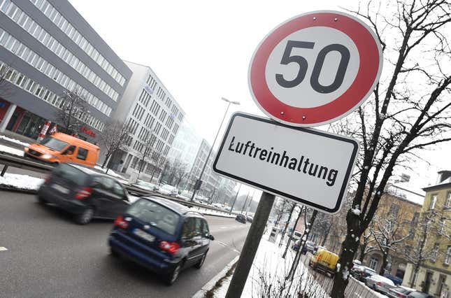 Cars drive along Landshuter Allee, one of the streets in Germany. 