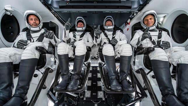 The Ax-1 crew inside a SpaceX Crew Dragon capsule. 