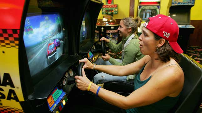 Lea Ann Parsley, member of the USA Olympic Skeleton Team, plays Daytona USA at an arcade in Lake Placid, New York on Oct. 10, 2005.