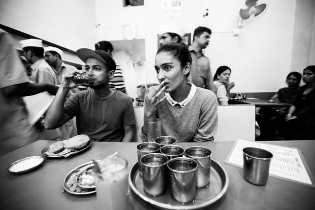 Dayana Erappa with a friend over poha and sol kadhi at Prakash Snacks, Dadar, Mumbai. Jan 27, 2016