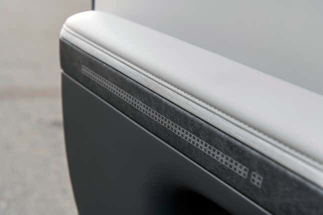 The stone-like finish on the door panels is particularly charming.