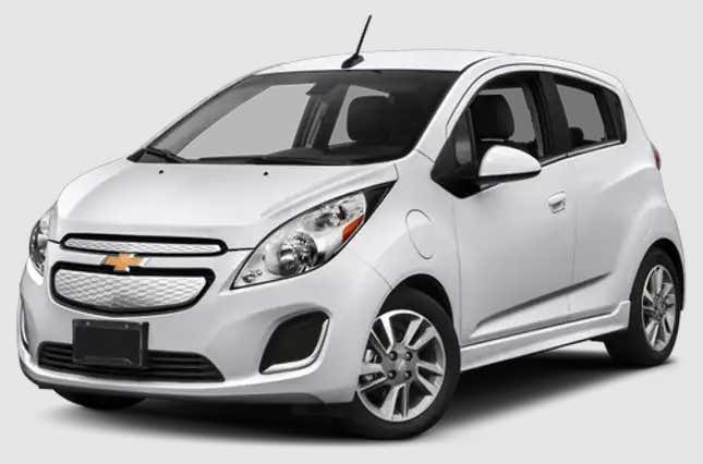 A white Chevrolet Spark is on a white background