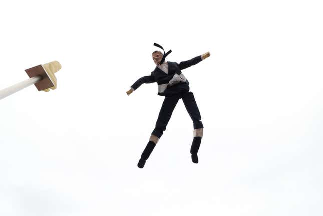 A puppet depicting French President Emmanuel Macron is tossed into the air during a demonstration against French government’s pensions reform plans in Nice as part of a day of national strike and protests in France, December 5, 2019. REUTERS/Eric Gaillard – RC2ZOD9LKESR