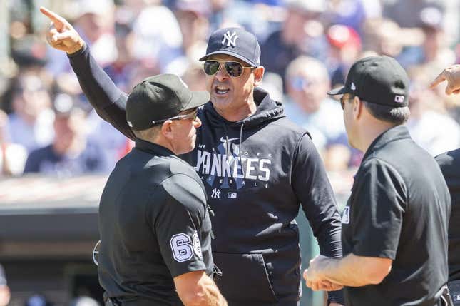 Apr 12, 2023; Cleveland, Ohio, USA; New York Yankees manager Aaron Boone argues a call with umpire Chris Guccione (68) during the first inning against the Cleveland Guardians at Progressive Field. Boone was ejected.