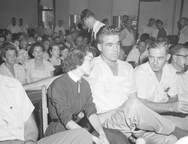 In this Sept. 22. 1955 photo, Carolyn Bryant rests her head on her husband Roy Bryant’s shoulder after she testified in Emmett Till murder court case in Sumner, Miss. Stymied in their calls for a renewed investigation into the murder of Emmett Till, relatives and activists are advocating another possible path toward accountability in Mississippi: They want authorities to launch a kidnapping prosecution against the woman who set off the lynching by accusing the Chicago teen of improper advances in 1955