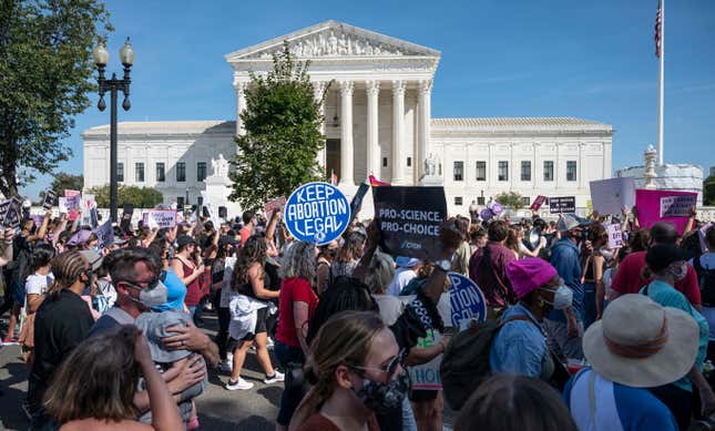 Protesters take part in the Women’s March and Rally for Abortion Justice at the US Supreme Court in Washington, DC, on October 2, 2021. (Photo by ANDREW CABALLERO-REYNOLDS / AFP) (Photo by ANDREW CABALLERO-REYNOLDS/AFP via Getty Images)
