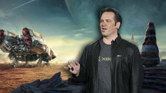 Xbox boss Phil Spencer speaks in front of a screenshot of Starfield. 