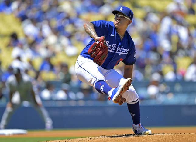 Aug 13, 2023; Los Angeles, California, USA;  Los Angeles Dodgers starting pitcher Julio Urias (7) throws to the plate in the first inning against the Colorado Rockies at Dodger Stadium.