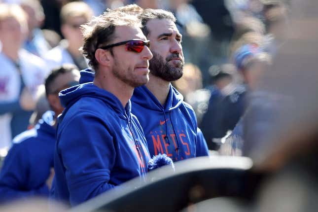 Apr 9, 2023; New York City, New York, USA; New York Mets starting pitchers Max Scherzer (left) and Justin Verlander stand together in the dugout during the seventh inning against the Miami Marlins at Citi Field.