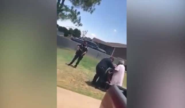 Image for article titled Watch: Black Texas Man’s Grandmother Stands Between Him and Gun-Wielding Police Officers...All Because He Reportedly Ran a Stop Sign