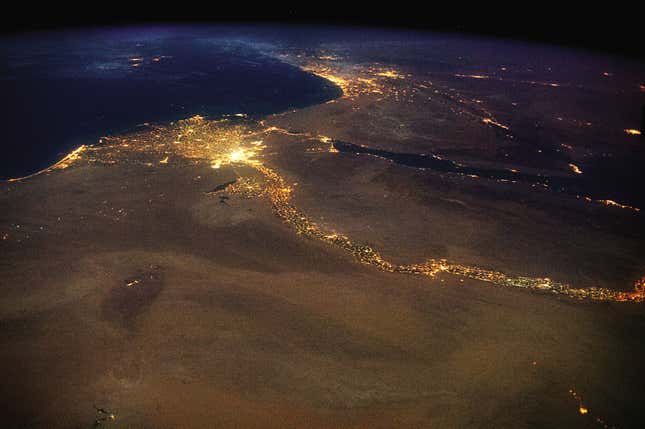 The bright lights of Cairo announce the opening of the north-flowing Nile’s delta, with Jerusalem answering to the northeast.