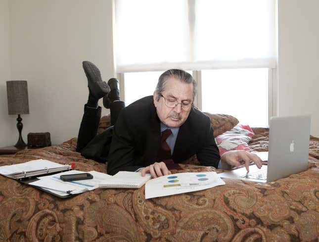 Image for article titled Businessman Does His Work Lying On Bed Like Schoolgirl