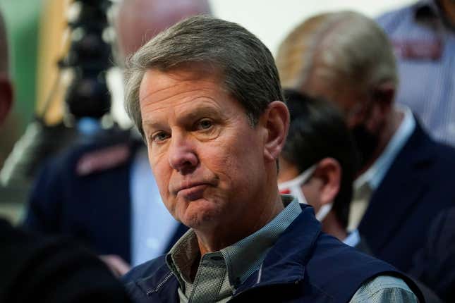 Georgia Gov. Brian Kemp listens to a question during a news conference at the State Capitol on Saturday, April 3, 2021, in Atlanta, about Major League Baseball’s decision to pull the 2021 All-Star Game from Atlanta over the league’s objection to a new Georgia voting law.