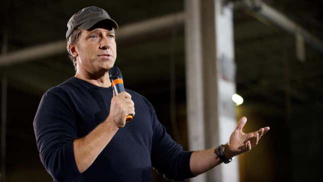 Mike Rowe takes part in a roundtable discussion on manufacturing with Republican presidential candidate Mitt Romney in 2012. 