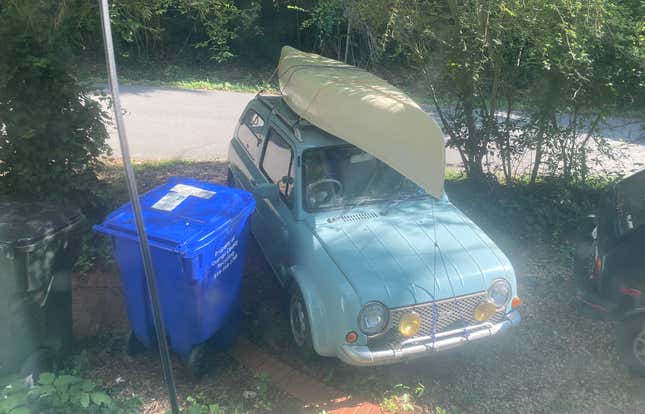 Image for article titled A Nissan Pao Makes A Perfectly Capable Canoe Hauler In Case You Were Curious