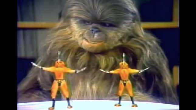 Chewbacca’s horrible son Lumpy watches something horrible during the horrible Holiday Special.