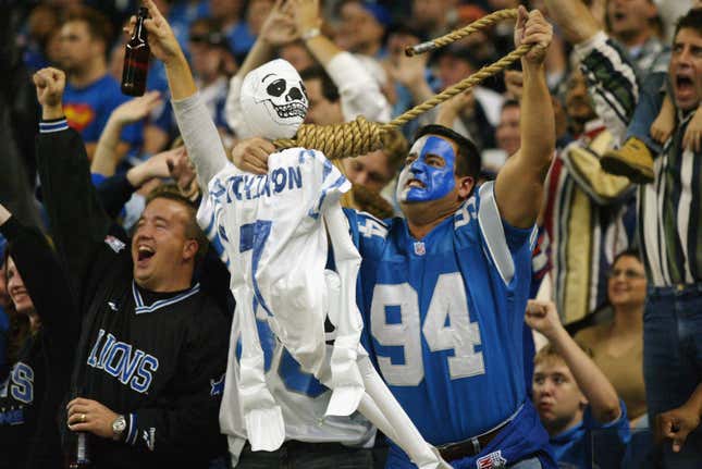 A male Detroit Lion fan enjoys using a rope noose to hang a blow up skeleton wearing a replica jersey of quarterback Chad Hutchinson #7 of the Dallas Cowboys by the neck during the game on November 3, 2002 at Ford Field in Detroit, Michigan.