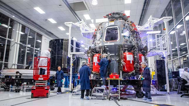 SpaceX employees working on the Crew Dragon spacecraft at SpaceX HQ in Hawthorne, California, in October 2019.