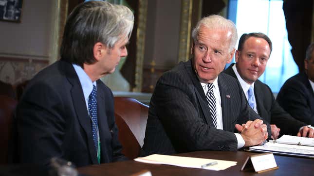 Then-Vice President Joe Biden (C) speaking with John Riccitiello, then CEO of Electronic Arts (L), and Mike Gallagher, then CEO of the Entertainment Software Association (R), in 2013.