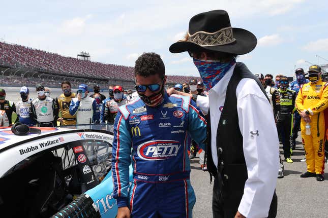 Bubba Wallace shared an emotional moment with team owner Richard Petty on Monday at Talladega Superspeedway.