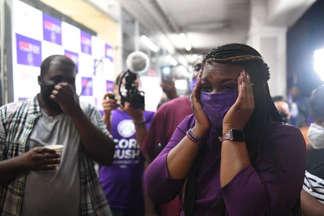 Missouri Democratic congressional candidate Cori Bush celebrates with friends and family at her campaign office on August 4, 2020 in St. Louis, Missouri.