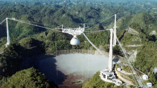 Aerial view of the big dish and platform, showing the Arecibo Observatory prior to the recent damage. 