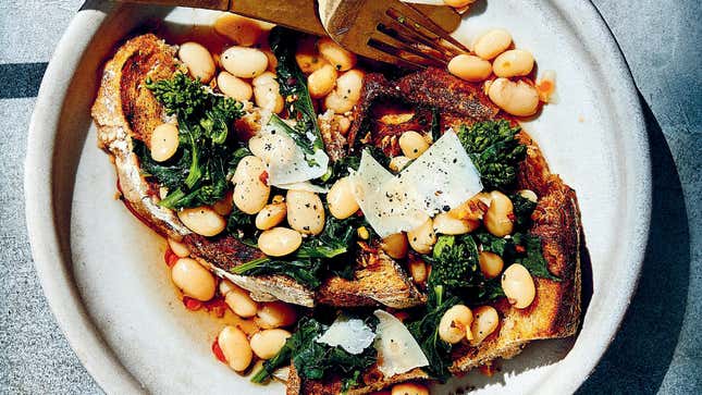 Cookbook shot of beans and broccoli on toast