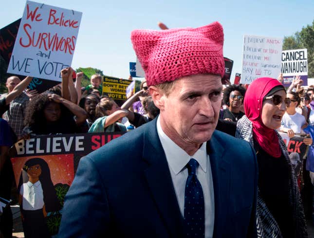 Image for article titled Pussy-Hat-Wearing Jeff Flake Spotted Protesting Outside Senate Ahead Of Voting Yes For Kavanaugh
