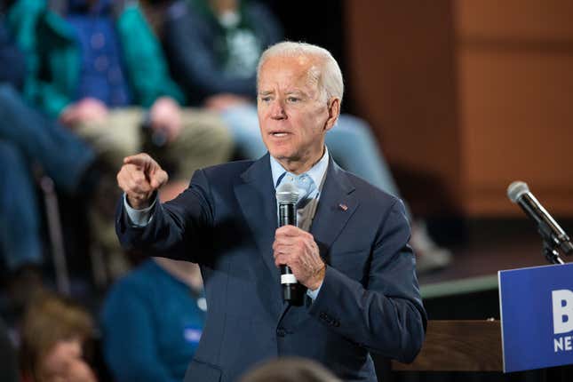Democratic presidential candidate, former Vice President Joe Biden points to a member of the crowd who wanted to ask a question during a campaign Town Hall on December 30, 2019 in Derry, New Hampshire. 