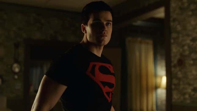 Superboy, looking pretty calm while taking gunfire to the chest.
