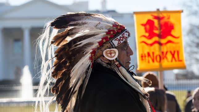 Lakota spiritual leader Chief Arvol Looking Horse attends a demonstration against the proposed Keystone XL Pipeline outside the White House on January 28, 2015. 