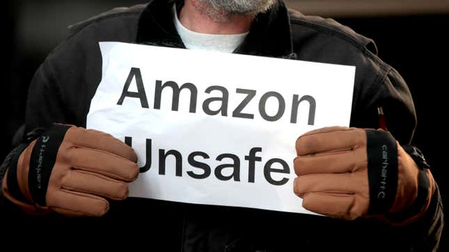 Former injured Amazon employees join labor organizers and community activists to demonstrate and hold a press conference outside of an Amazon Go store in the loop to express concerns about what they claim is the company’s “alarming injury rate” among warehouse workers on December 10, 2019 in Chicago, Illinois.