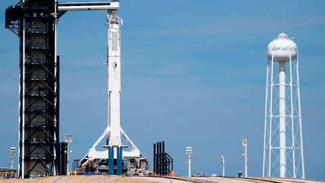 The SpaceX Falcon 9 rocket with the unmanned Crew Dragon capsule on its nose sits at Kennedy Space Center in Florida on March 1, 2019.