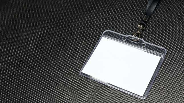 conference badge holder, blank, on a table