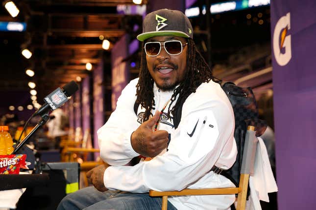 Image for article titled In True Black Superhero Form, Marshawn Lynch Reveals That the Source of His Super Powers Was Hennessy
