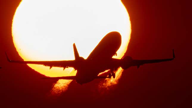 A plane in front of the sun. It’s a metaphor.