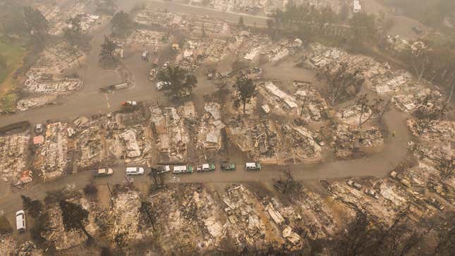 Search and rescue vehicles from the Jackson County Sheriff’s Office are seen in a mobile home park that was destroyed by wildfire in Ashland, Oregon.