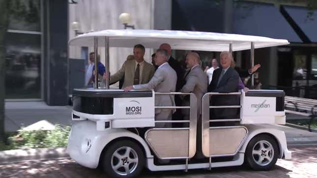 Tampa officials ride in a Meridian-branded autonomous vehicle in 2016.