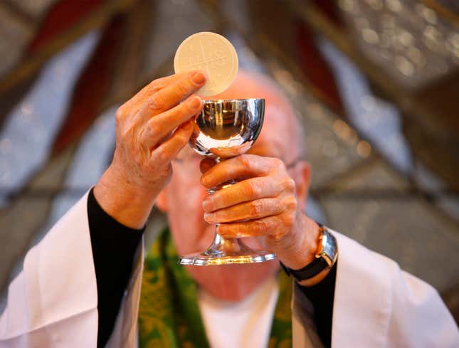 Image for article titled Fantasizing Priest Accidentally Turns Communion Wafer Into Body Of Altar Boy
