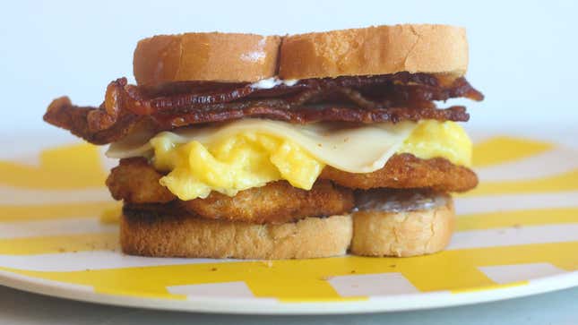 Image for article titled You Should Put Onion Rings on Your Breakfast Sandwich