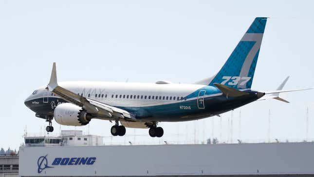A Boeing 737 Max jet lands following a Federal Aviation Administration test flight at Boeing Field in Seattle on June 29, 2020. 