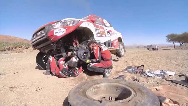 Here's Two-Time F1 World Champion Fernando Alonso Fixing His Own Broken Race Car